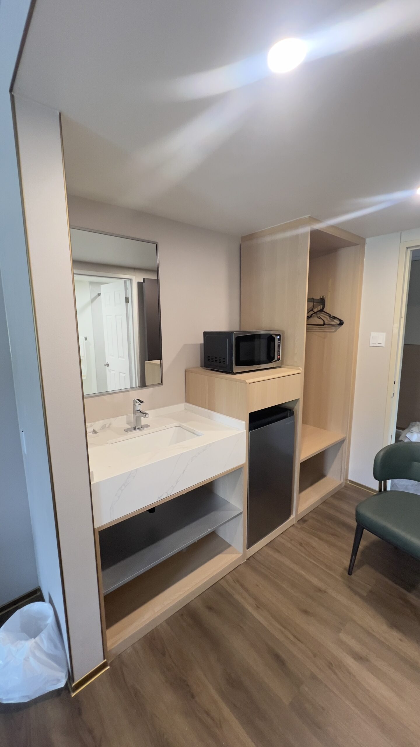 Guest-room vanity and fitted cabinetry installation