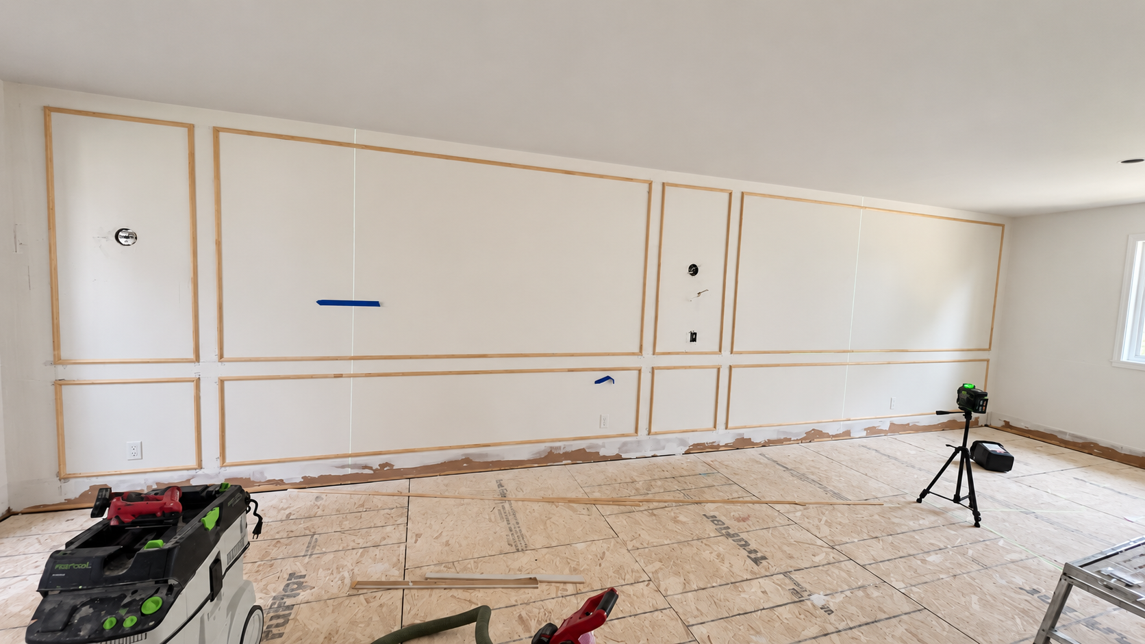 Decorative wall panel installation in a residential room